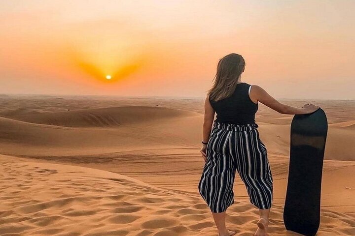 Experience a Dubai desert safari with dune bashing, camel rides, live shows, and BBQ dinner, photo 14 | wizardtrip