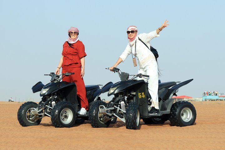 Experience a Dubai desert safari with dune bashing, camel rides, live shows, and BBQ dinner, photo 16 | wizardtrip