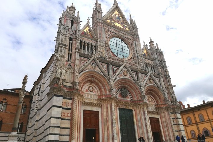 Excursion d'une journée de Florence à Sienne et San Gimignano, avec architecture médiévale et paysages toscans, photo 13 | wizardtrip