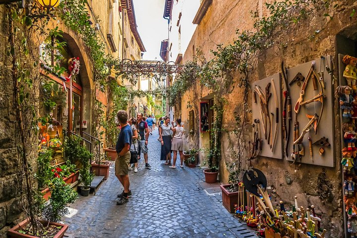 Excursion d'une journée de Florence à Sienne et San Gimignano, avec architecture médiévale et paysages toscans, photo 23 | wizardtrip