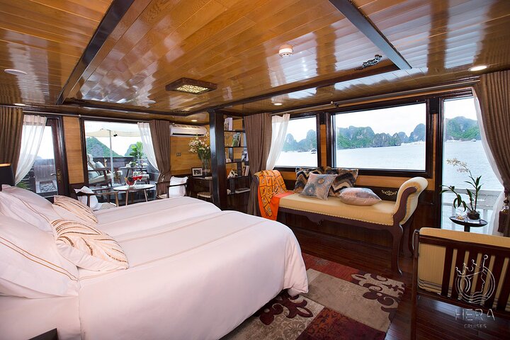 Luxury Hera Cruise navigating through the stunning karst formations of Halong Bay, Vietnam, photo 6 | wizardtrip