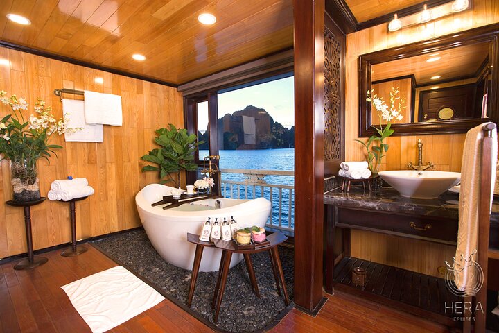 Luxury Hera Cruise navigating through the stunning karst formations of Halong Bay, Vietnam, photo 7 | wizardtrip