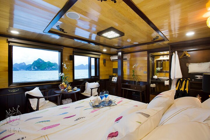 Luxury Hera Cruise navigating through the stunning karst formations of Halong Bay, Vietnam, photo 12 | wizardtrip