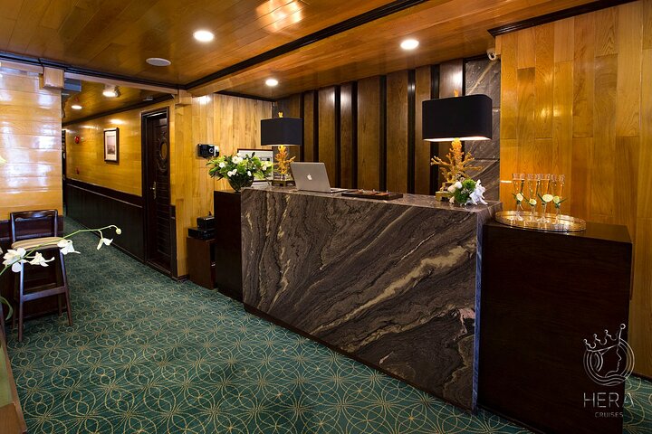 Luxury Hera Cruise navigating through the stunning karst formations of Halong Bay, Vietnam, photo 14 | wizardtrip