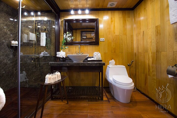 Luxury Hera Cruise navigating through the stunning karst formations of Halong Bay, Vietnam, photo 16 | wizardtrip