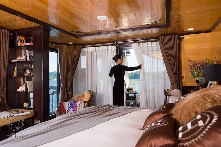 Luxury Hera Cruise navigating through the stunning karst formations of Halong Bay, Vietnam, photo 17 | wizardtrip