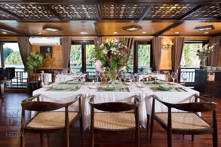 Luxury Hera Cruise navigating through the stunning karst formations of Halong Bay, Vietnam, photo 21 | wizardtrip