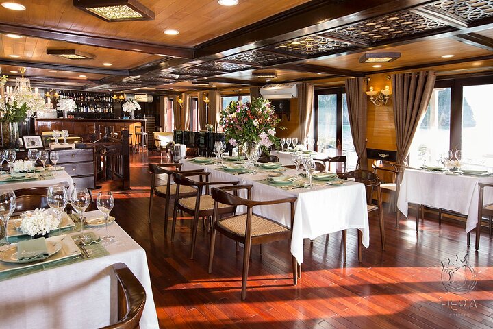 Luxury Hera Cruise navigating through the stunning karst formations of Halong Bay, Vietnam, photo 22 | wizardtrip