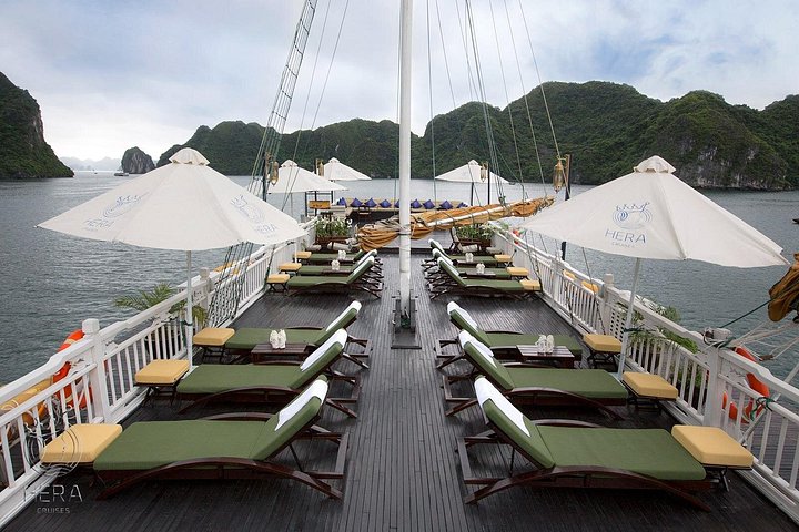 Luxury Hera Cruise navigating through the stunning karst formations of Halong Bay, Vietnam, photo 24 | wizardtrip