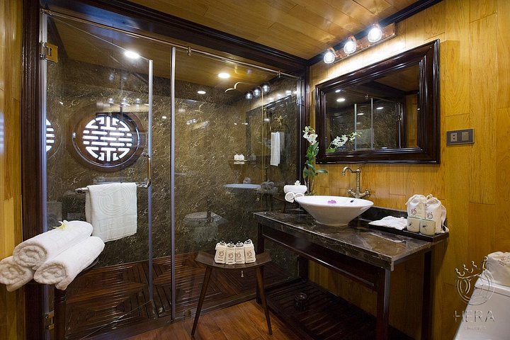 Luxury Hera Cruise navigating through the stunning karst formations of Halong Bay, Vietnam, photo 28 | wizardtrip