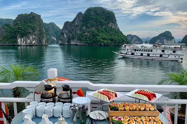Luxury Hera Cruise navigating through the stunning karst formations of Halong Bay, Vietnam, photo 30 | wizardtrip