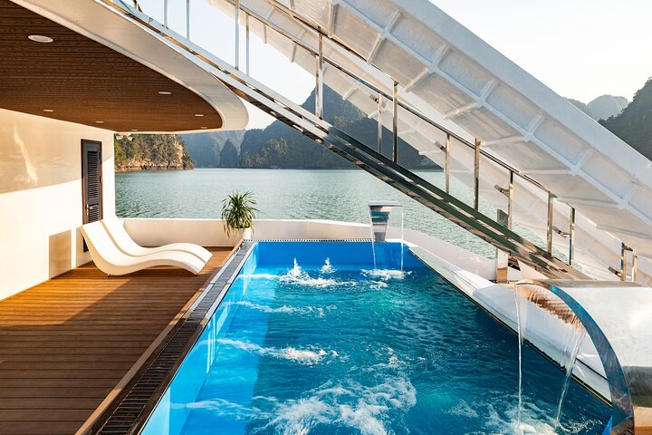 Luxury Hera Cruise navigating through the stunning karst formations of Halong Bay, Vietnam, photo 32 | wizardtrip