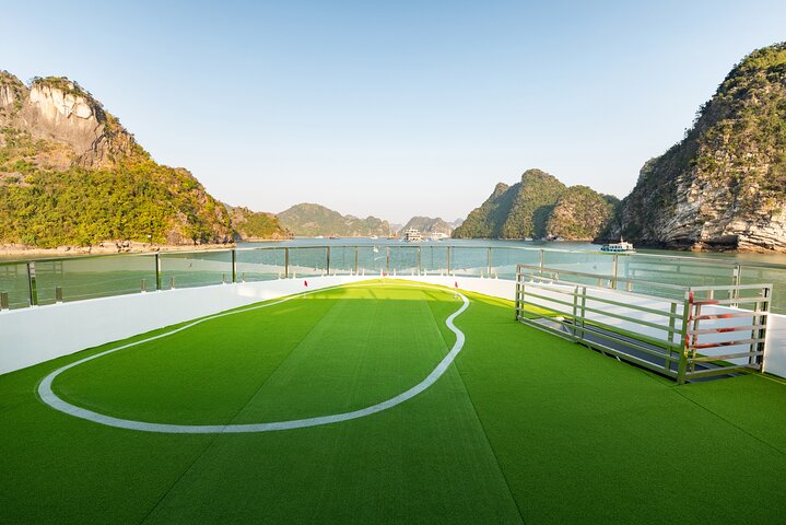 Luxury Hera Cruise navigating through the stunning karst formations of Halong Bay, Vietnam, photo 33 | wizardtrip