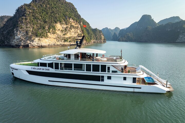 Luxury Hera Cruise navigating through the stunning karst formations of Halong Bay, Vietnam, photo 35 | wizardtrip