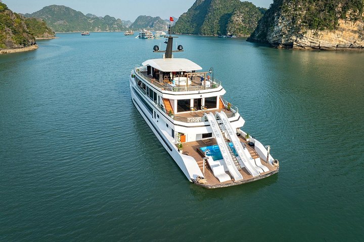 Luxury Hera Cruise navigating through the stunning karst formations of Halong Bay, Vietnam, photo 39 | wizardtrip