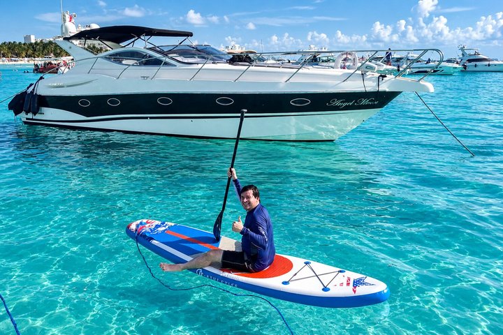 Noleggio di yacht privato di lusso che naviga nelle acque turchesi di Cancún, Messico, foto 20 | wizardtrip