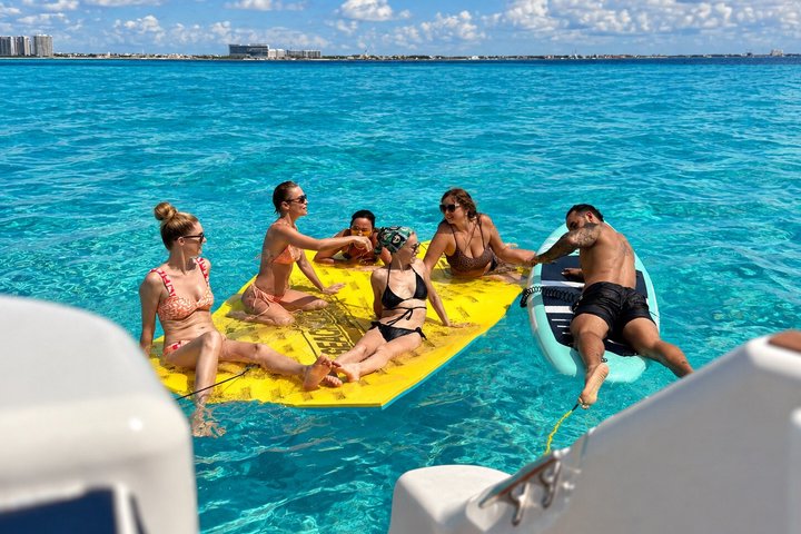 Luxury private yacht rental in Cancun with crew, offering Caribbean sea tours and water activities, photo 38 | wizardtrip