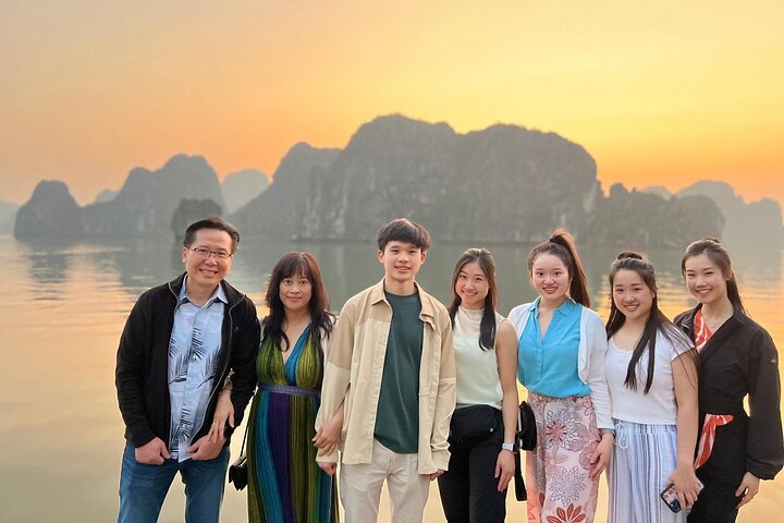 A scenic day tour of Halong Bay, Vietnam, featuring limestone karsts, emerald waters, and traditional boats, photo 42 | wizardtrip