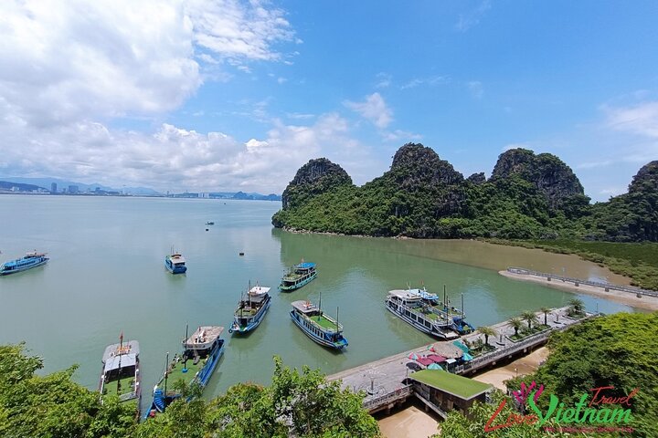 A scenic day tour of Halong Bay, Vietnam, featuring limestone karsts, emerald waters, and traditional boats, photo 44 | wizardtrip