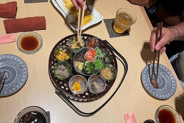 Kyoto food tour through Gion and Pontocho, featuring traditional Japanese dishes and nightlife, photo 10 | wizardtrip