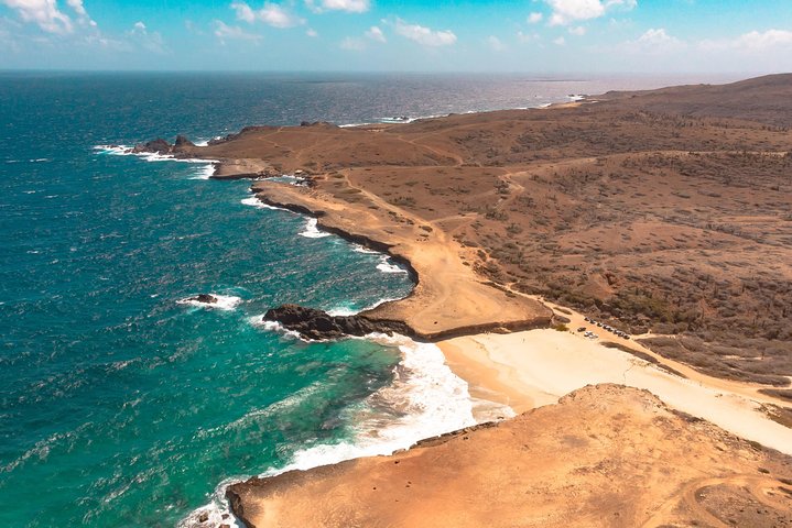 Jeep adventure exploring Aruba's Natural Pool, caves, and Baby Beach, photo 2 | wizardtrip