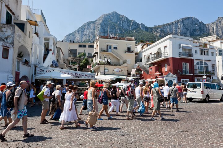 A scenic boat tour exploring the Blue Grotto and the island of Capri from Naples, photo 15 | wizardtrip
