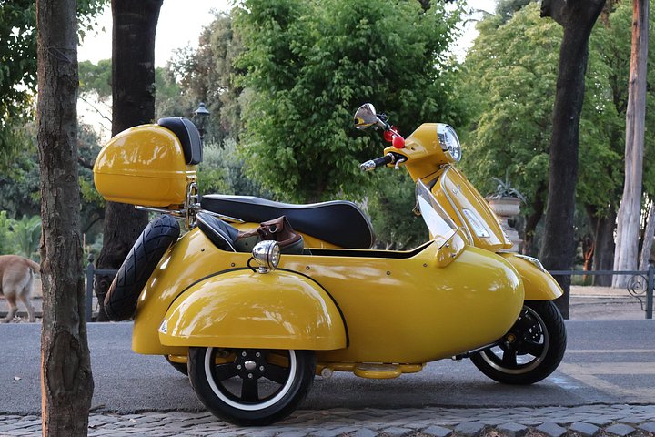 Ride through Rome's historic streets on a classic Vespa sidecar, visiting iconic landmarks, photo 12 | wizardtrip