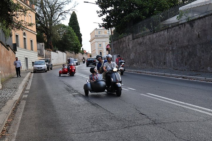 Ride through Rome's historic streets on a classic Vespa sidecar, visiting iconic landmarks, photo 21 | wizardtrip