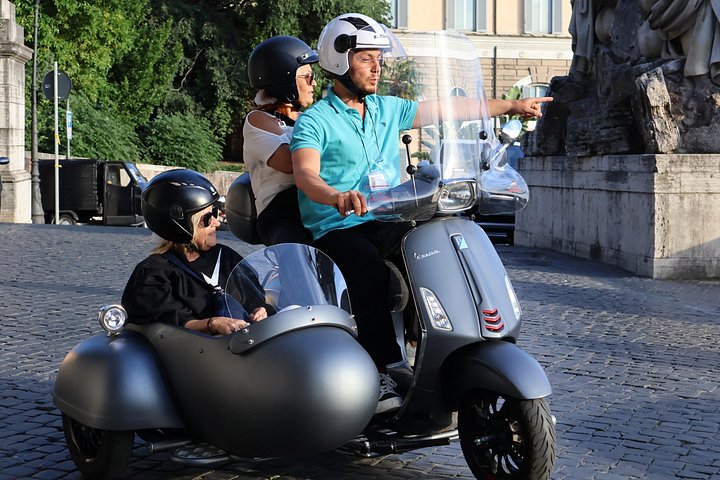Ride through Rome's historic streets on a classic Vespa sidecar, visiting iconic landmarks, photo 28 | wizardtrip
