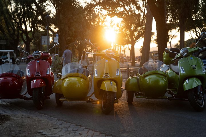 Ride through Rome's historic streets on a classic Vespa sidecar, visiting iconic landmarks, photo 30 | wizardtrip