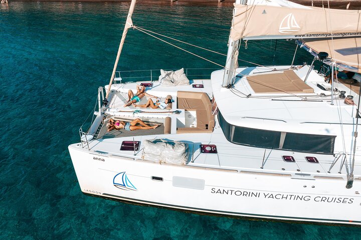 Luxury Santorini Catamaran Cruise: Lunch, BBQ, Drinks, Transfers | wizardtrip