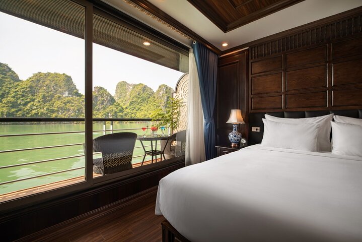 Luxury cruise navigating through the stunning limestone karsts of Ha Long Bay, Vietnam, photo 6 | wizardtrip