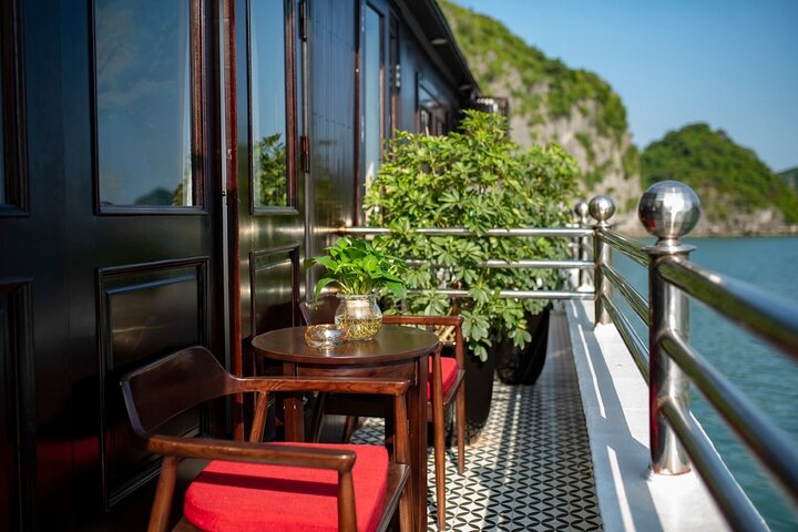 Luxury cruise navigating through the stunning limestone karsts of Ha Long Bay, Vietnam, photo 12 | wizardtrip