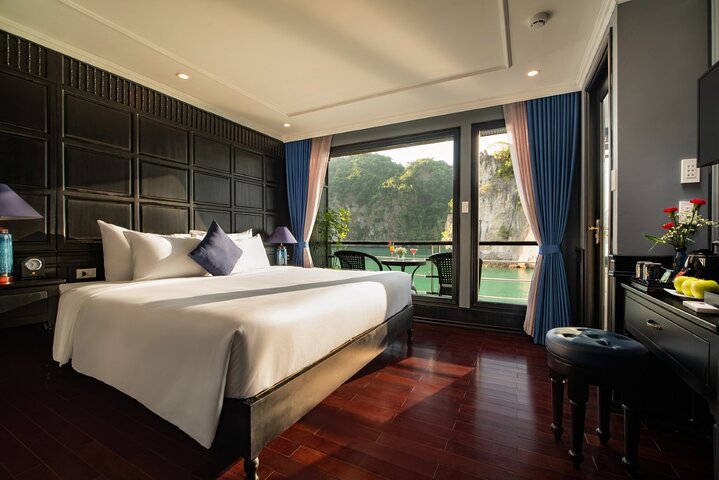 Luxury cruise navigating through the stunning limestone karsts of Ha Long Bay, Vietnam, photo 15 | wizardtrip