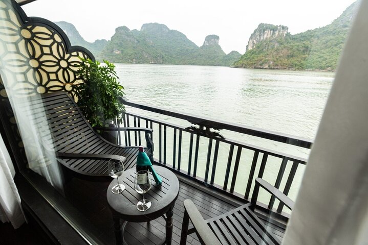 Luxury cruise navigating through the stunning limestone karsts of Ha Long Bay, Vietnam, photo 24 | wizardtrip