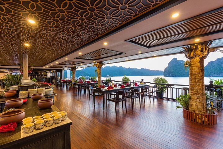 Luxury cruise navigating through the stunning limestone karsts of Ha Long Bay, Vietnam, photo 25 | wizardtrip