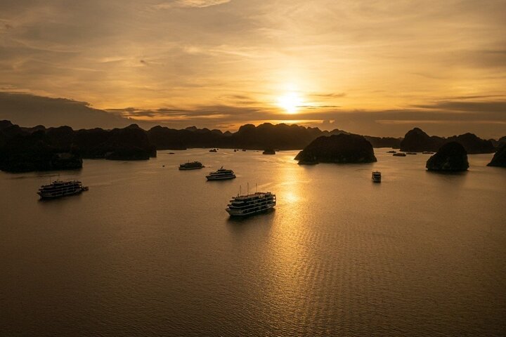 Luxury cruise navigating through the stunning limestone karsts of Ha Long Bay, Vietnam, photo 28 | wizardtrip