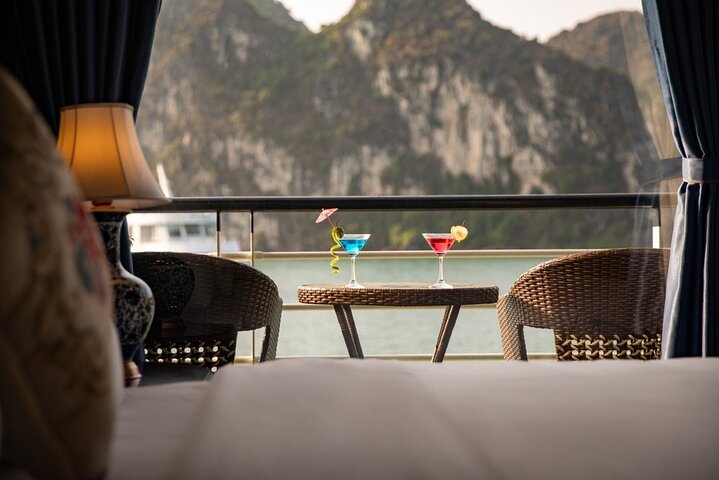 Luxury cruise navigating through the stunning limestone karsts of Ha Long Bay, Vietnam, photo 30 | wizardtrip