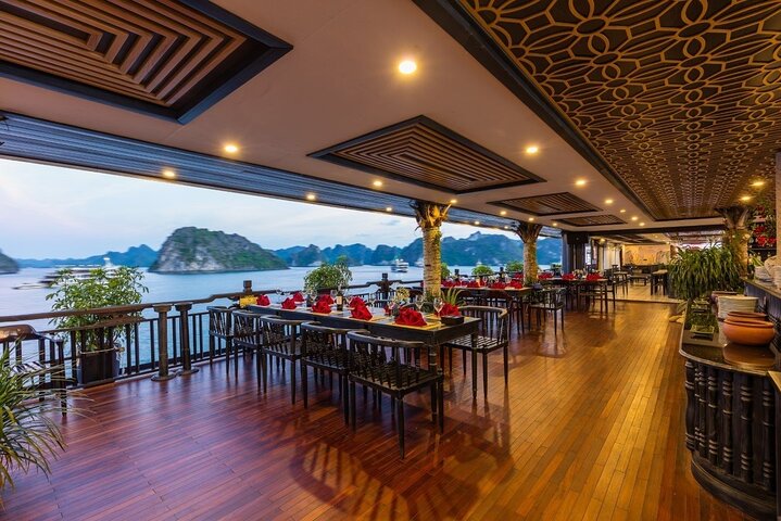 Luxury cruise navigating through the stunning limestone karsts of Ha Long Bay, Vietnam, photo 36 | wizardtrip