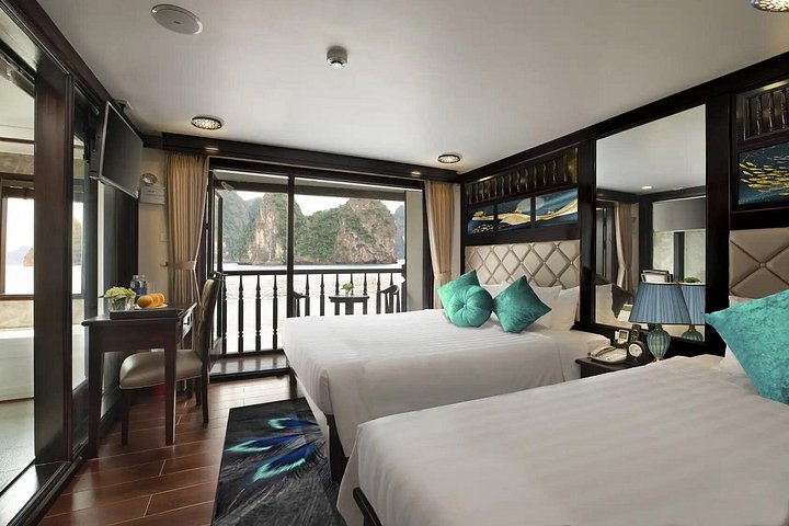 Luxury cruise navigating through the stunning limestone karsts of Ha Long Bay, Vietnam, photo 37 | wizardtrip
