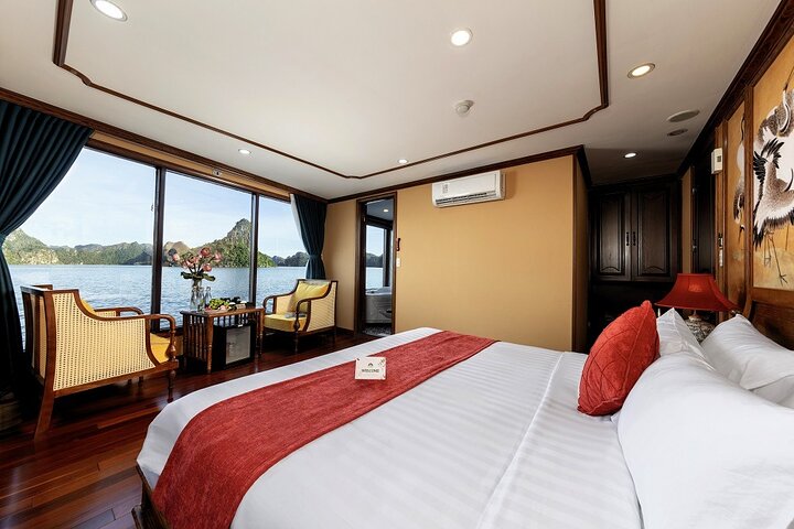 Luxury cruise navigating through the stunning limestone karsts of Ha Long Bay, Vietnam, photo 42 | wizardtrip