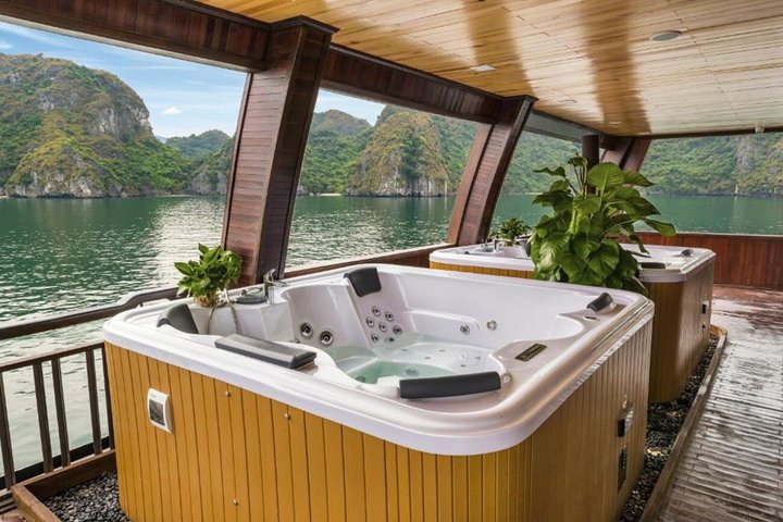 Luxury cruise navigating through the stunning limestone karsts of Ha Long Bay, Vietnam, photo 48 | wizardtrip