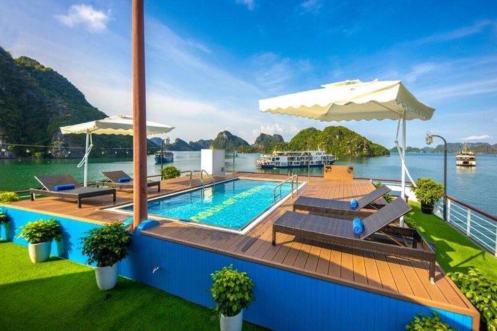 Luxury cruise navigating through the stunning limestone karsts of Ha Long Bay, Vietnam, photo 49 | wizardtrip