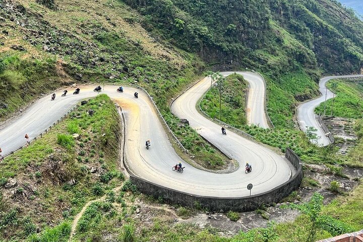 Malerische Motorradtour durch die dramatischen Landschaften von Ha Giang, einschließlich Pässe, Dörfer und kultureller Stätten, Foto 16 | wizardtrip