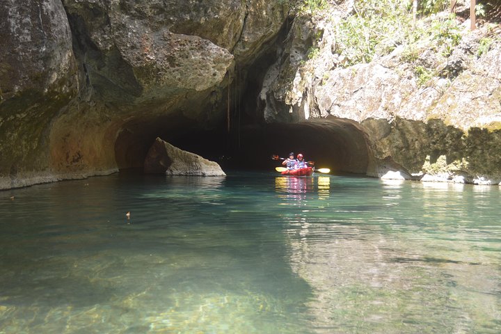 Kayaking through ancient caves in Belize, exploring underground rivers and formations, photo 8 | wizardtrip