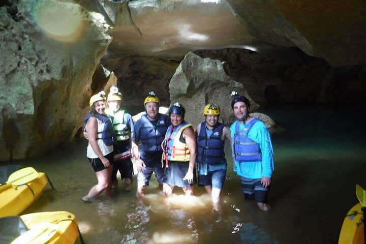 Kayaking through ancient caves in Belize, exploring underground rivers and formations, photo 9 | wizardtrip