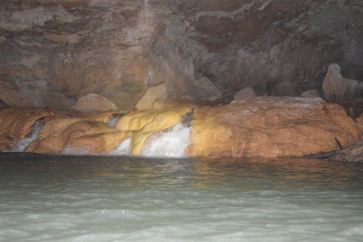 Kayaking through ancient caves in Belize, exploring underground rivers and formations, photo 10 | wizardtrip