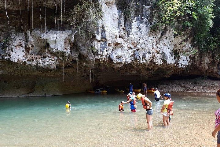 Kayaking through ancient caves in Belize, exploring underground rivers and formations, photo 11 | wizardtrip