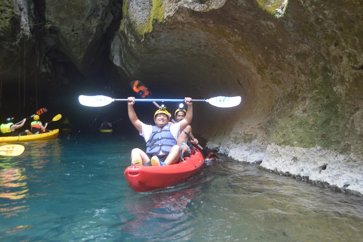 Kayaking through ancient caves in Belize, exploring underground rivers and formations, photo 13 | wizardtrip