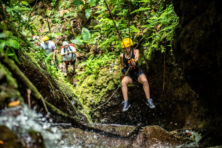 Experience thrilling waterfall rappelling and canyoning adventure in the lush rainforest near Arenal Volcano, Costa Rica, photo 6 | wizardtrip